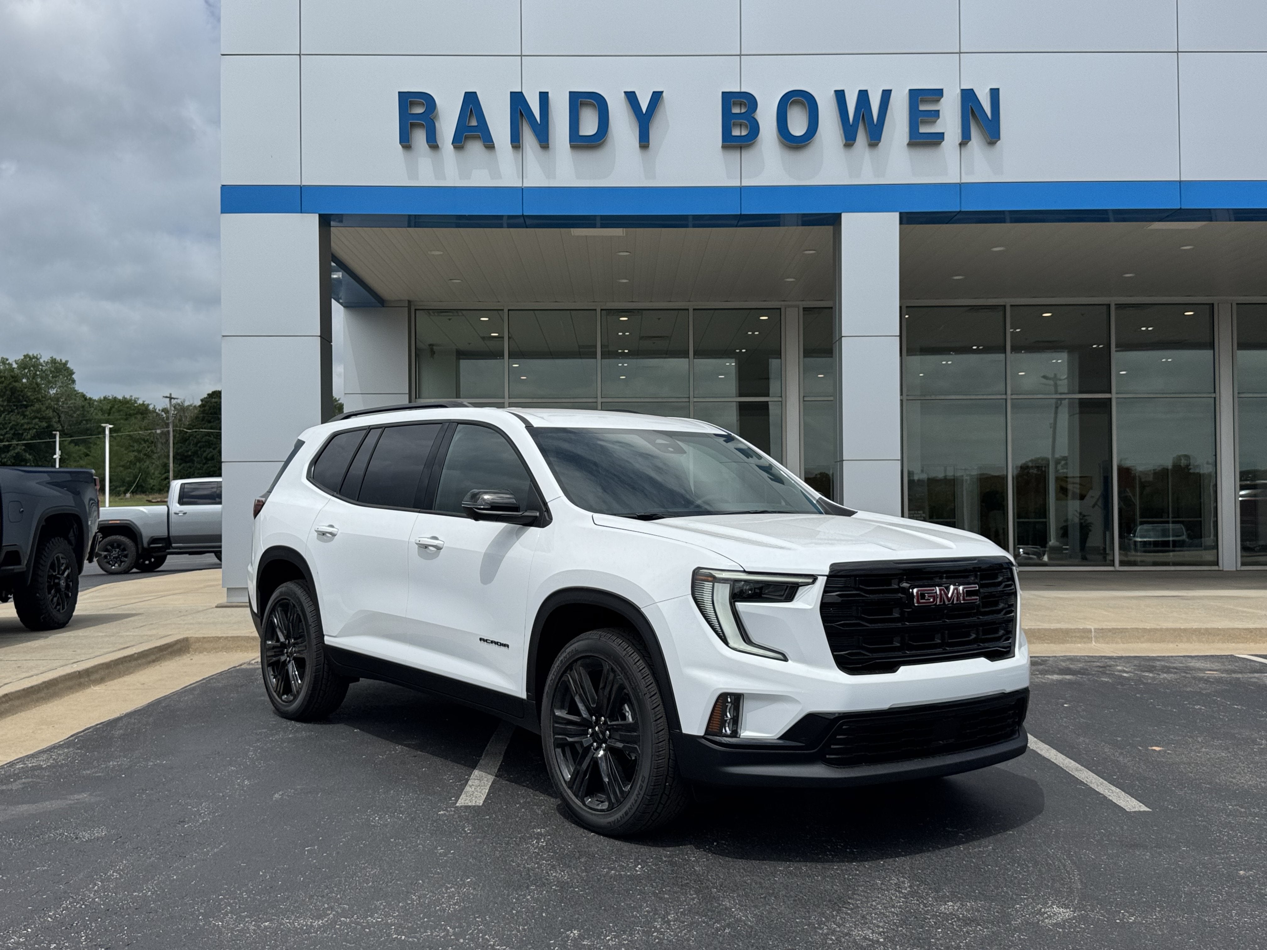 2026 GMC Acadia Elevation in Summit White — front three-quarter view