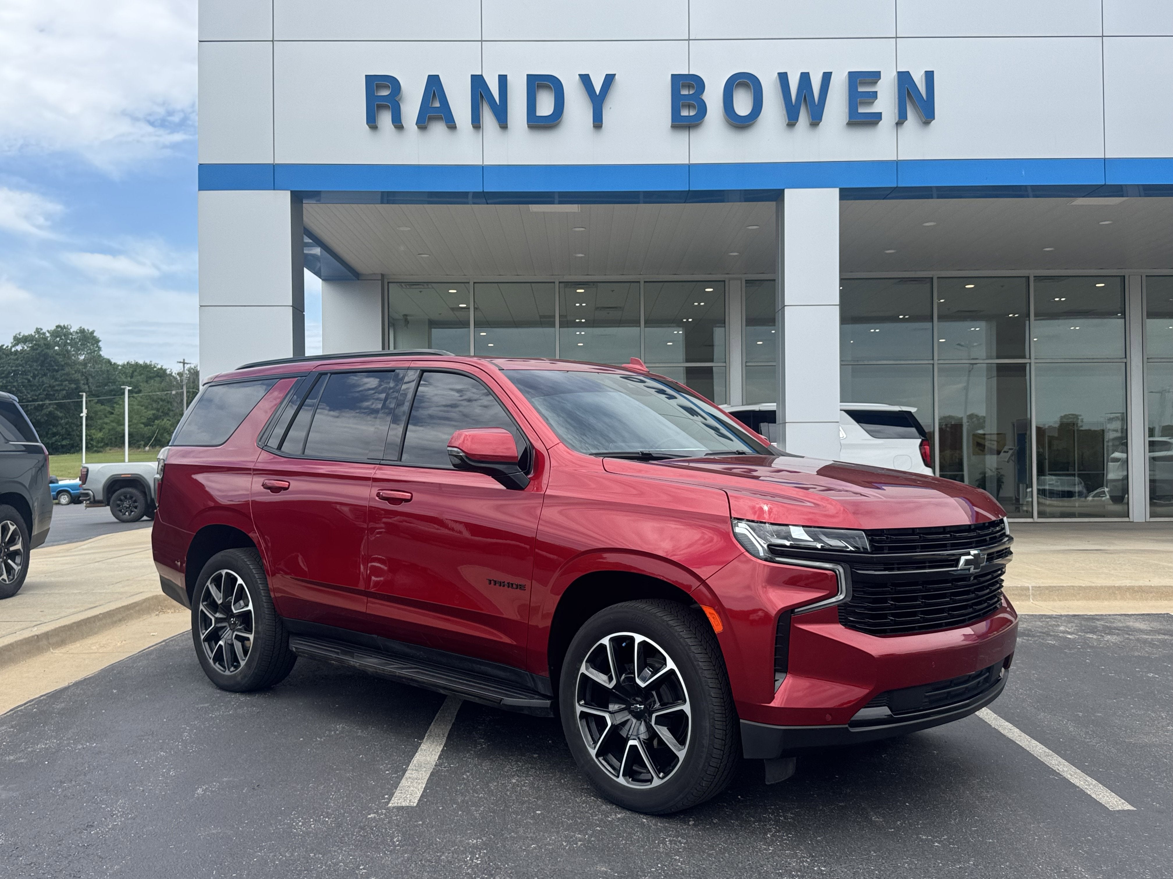 2024 Chevrolet Tahoe RST in Radiant Red Tintcoat — front three-quarter view