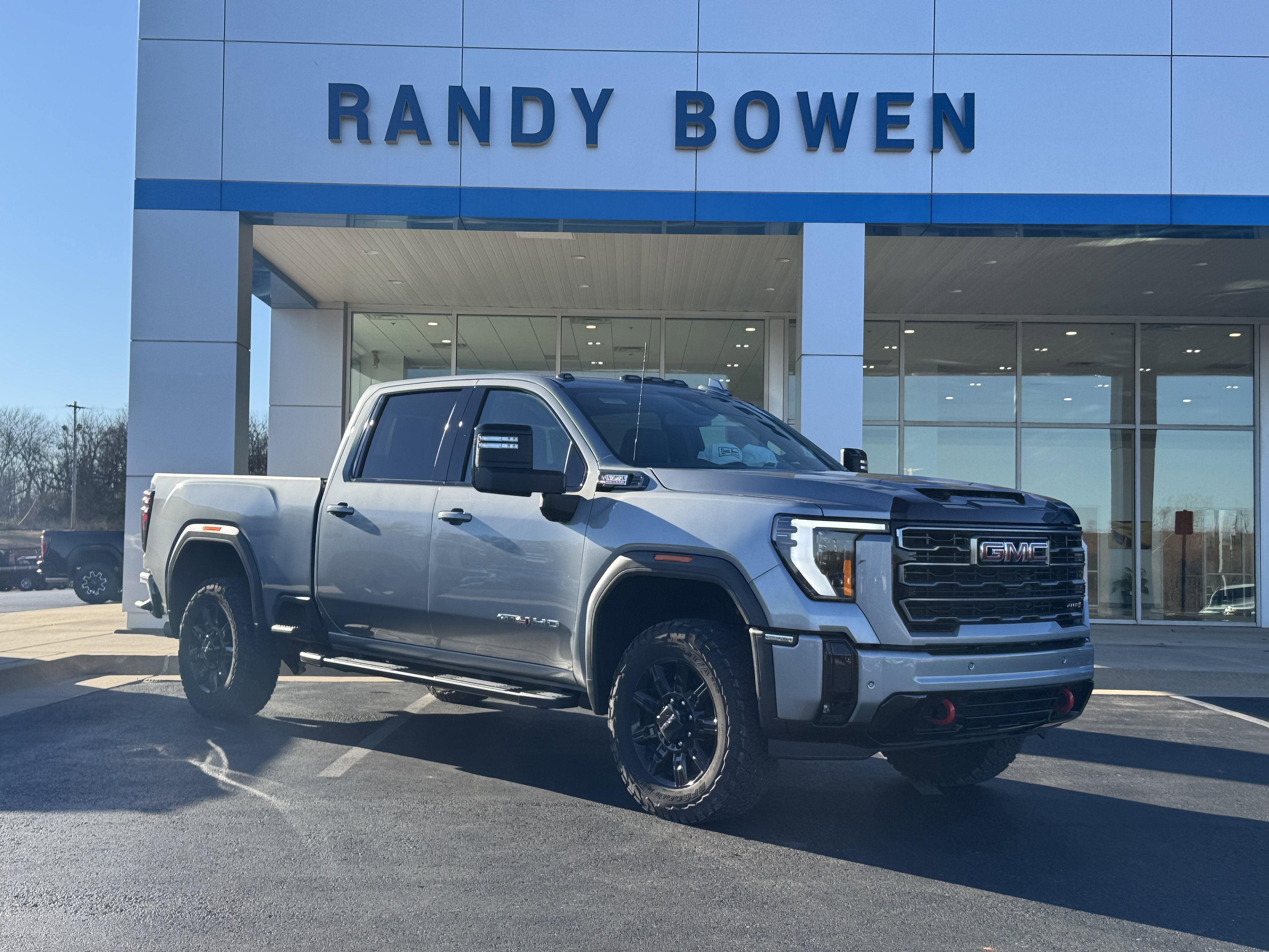 2025 GMC Sierra 2500 HD AT4 in Sterling Metallic — front three-quarter view