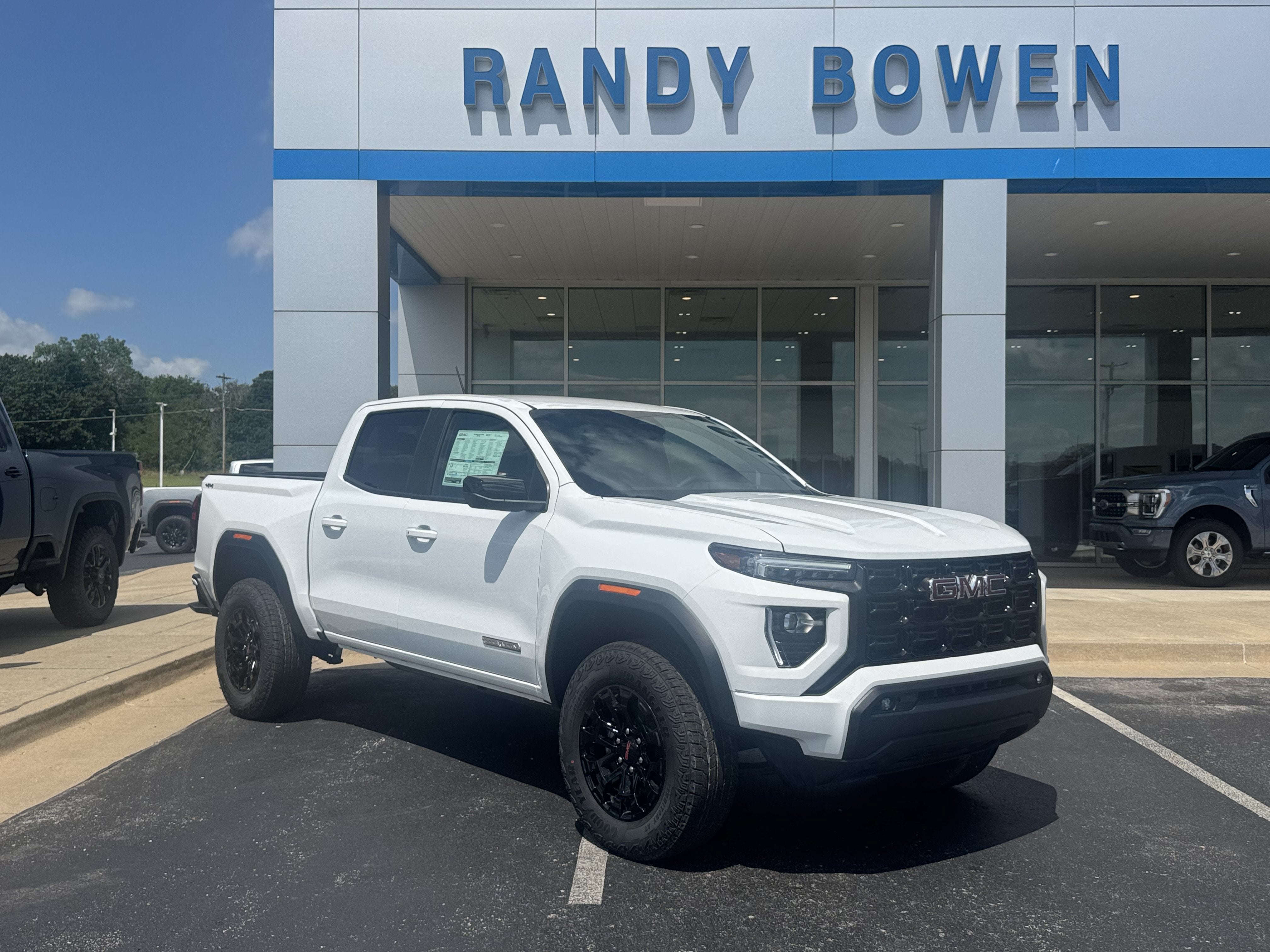 2026 GMC Canyon Elevation in Summit White — front three-quarter view