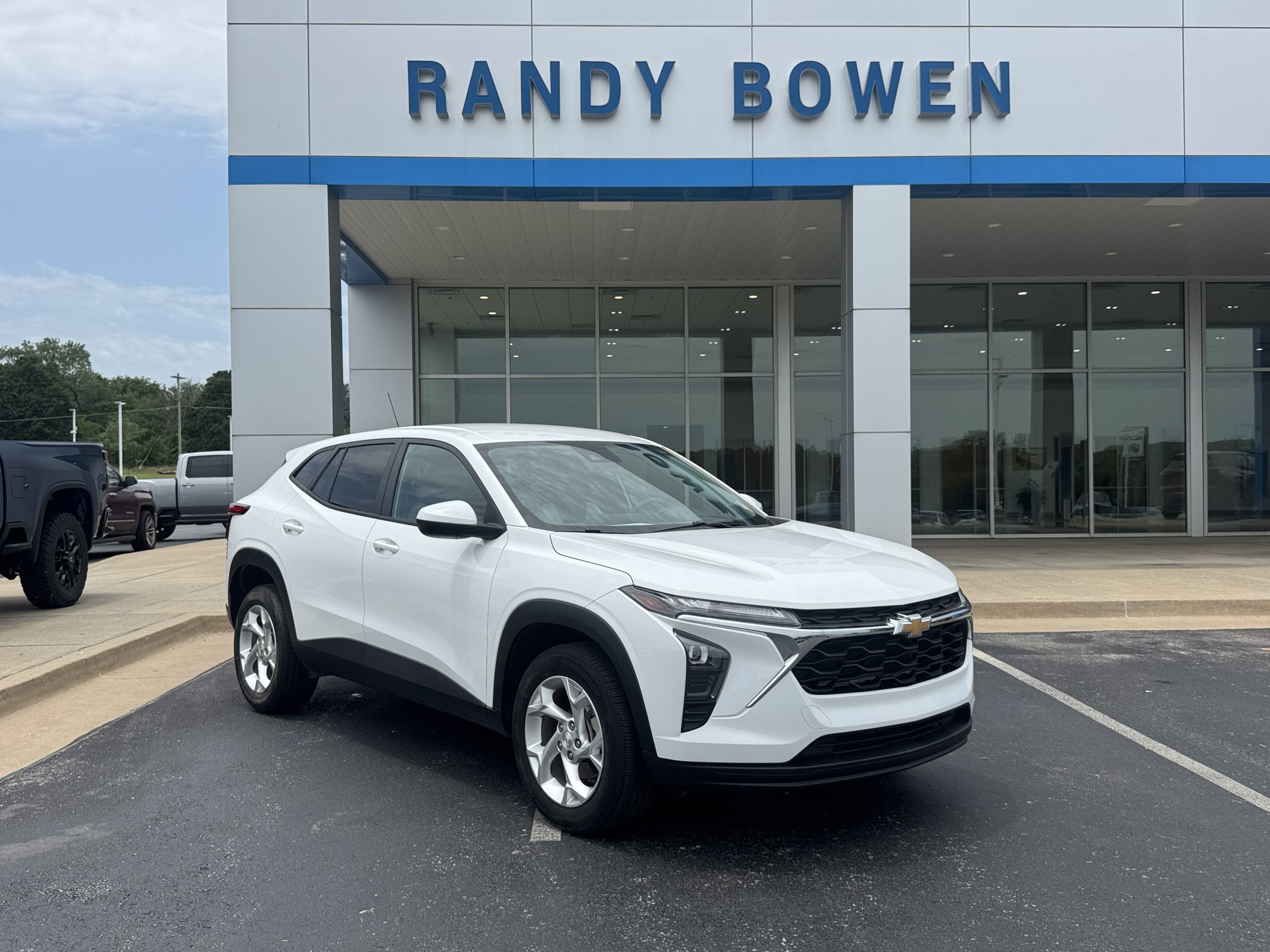 2024 Chevrolet Trax LS in Summit White — front three-quarter view